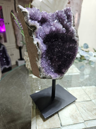 Amethyst on Metal Stand

CHIQUE Rock Shop