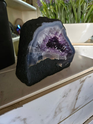 Amethyst Geode with on a marble surface

CHIQUE Rock Shop 