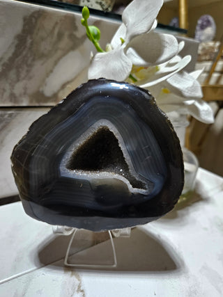 Dark Gray Geode, Blue Hues, White trim.

CHIQUE Rock Shop 