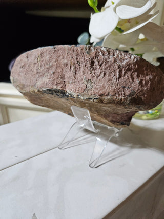 Back Agate crystal on a clear stand

CHIQUE Rock Shop