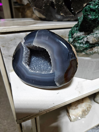Dark Blue Agate Geode

CHIQUE Rock Shop