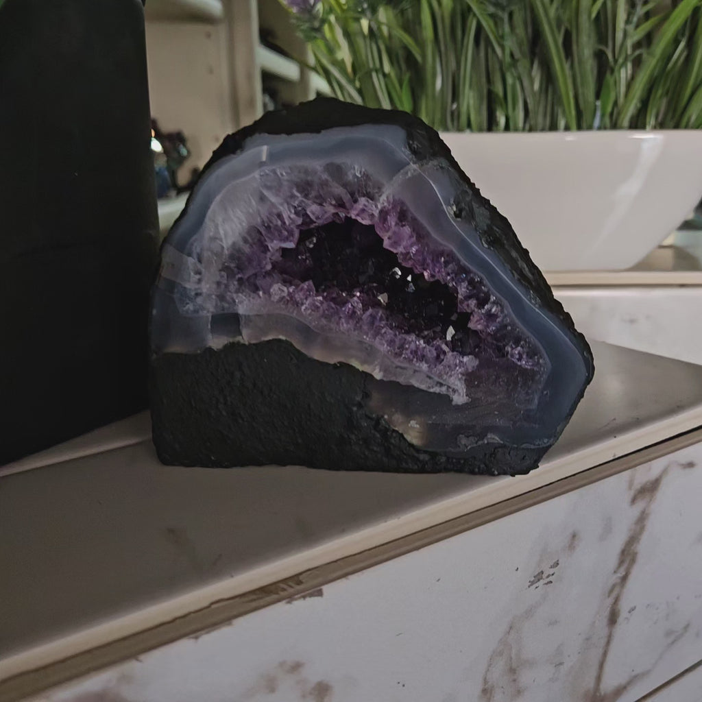 Amethyst Geode with on a marble surface

CHIQUE Rock Shop 