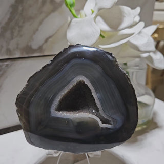 Dark Gray Geode, Blue Hues, White trim.

CHIQUE Rock Shop 